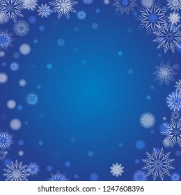 Winter background with blurred and clear snowflake