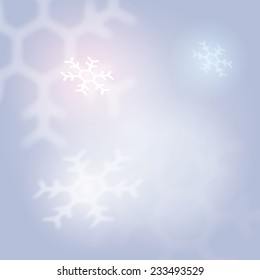 winter background with blurred falling snowflakes