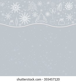 Winter background of delicate snowflakes and Christmas objects on a silver background. For postcards, greetings, and inscriptions.