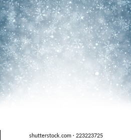 Winter background. Fallen defocused snowflakes. Christmas. Vector.   