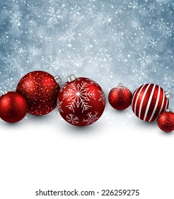 Winter background. Fallen defocused snowflakes. Christmas red balls. Vector.  