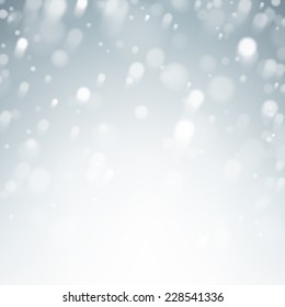 Winter background. Fallen defocused snowflakes. Christmas. Vector. 