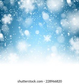 Winter background. Fallen defocused snowflakes. Christmas. Vector.  