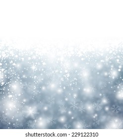 Winter background. Fallen defocused snowflakes. Christmas. Vector.   