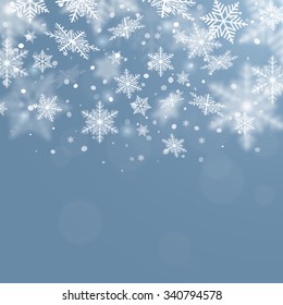 Winter background. Fallen defocused snowflakes. Christmas. Vector. 