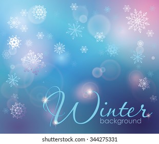 Winter background with flying tracery snowflakes.