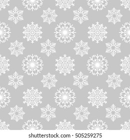 Winter background with frozen snowflakes on grey backdrop. Snowflakes seamless pattern. Vector illustration