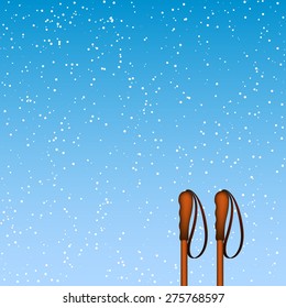 Winter background with old ski poles and falling snowflakes