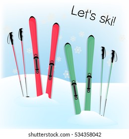 Winter background. Ski equipment in the snow.