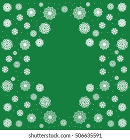 Winter background with snow and snowflakes. Template greeting cards. Green background with white snowflakes. Frame of white snowflakes for the label.