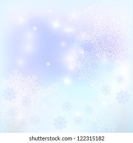 Winter background. Snowflakes and glare.