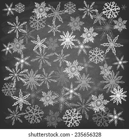 Winter Background with Snowflakes on the blackboard. Winter. Vector illustration. 