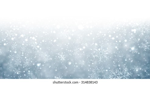 Winter background with snowflakes and place for text. Christmas blue defocused illustration. Eps10 vector. 
