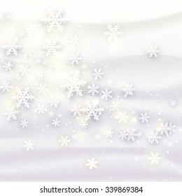 Winter background with snowflakes for season greetings