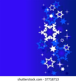 Winter background with snowflakes.Blue.