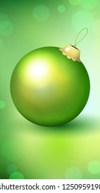 Winter background for vertical screens with a large green Christmas ball