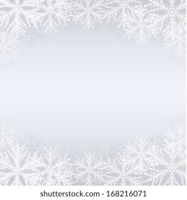Winter background with white snowflakes