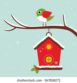 winter bird house and bird on a branch