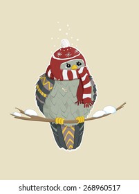 winter bird on a branch in a warm scarf and hat