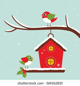 winter birdhouse on a branch and birds