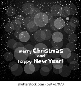 Winter black bokeh background with snow. Lettering merry Christmas and happy New Year