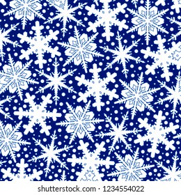 Winter blue background with white snowflakes.