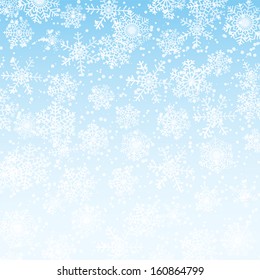 Winter blue sky with fallen snowflakes