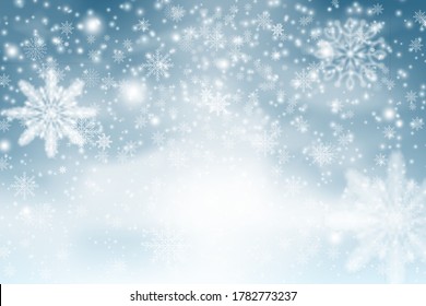 Winter blue sky with falling snow, snowflake. Christmas snow surface. Christmas Snowflakes Shining