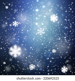 Fondo bokeh borroso de invierno con copos de nieve brillantes. Gran diseño de vacaciones para tarjetas de felicitación de año Nuevo, carteles y volantes, etc