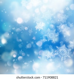Winter Bokeh Background with Blurred Snowflakes. Design for New Year Greeting Cards, Posters and Flyers. And also includes EPS 10 vector