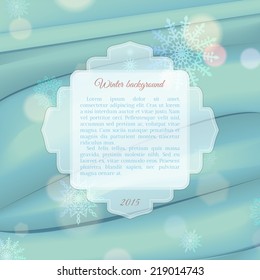 Winter bokeh and snowflakes background with frame for text