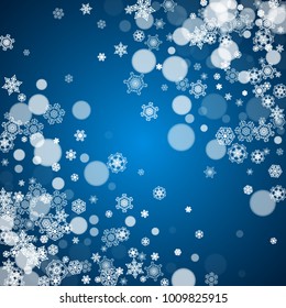 Winter border with white snowflakes for Christmas and New Year celebration. Holiday winter border on blue background for banners, gift coupons, vouchers, ads, party events. Falling frosty snowflakes.