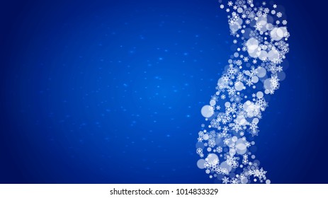 Winter border with white snowflakes for Christmas and New Year celebration. Horizontal winter border on blue background for banners, gift coupon, voucher, ads, party events. Falling frosty snowflakes.