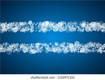 Winter border with white snowflakes for Christmas and New Year celebration. Horizontal winter border on blue background for banners, gift coupon, voucher, ads, party events. Falling frosty snowflakes.