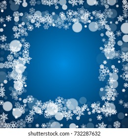 Winter border with white snowflakes for Christmas and New Year celebration. Holiday winter border on blue background for banners, gift coupons, vouchers, ads, party events. Falling frosty snowflakes.