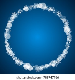 Winter border with white snowflakes for Christmas and New Year celebration. Holiday winter border on blue background for banners, gift coupons, vouchers, ads, party events. Falling frosty snowflakes.