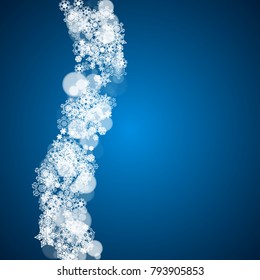 Winter border with white snowflakes for Christmas and New Year celebration. Holiday winter border on blue background for banners, gift coupons, vouchers, ads, party events. Falling frosty snowflakes.