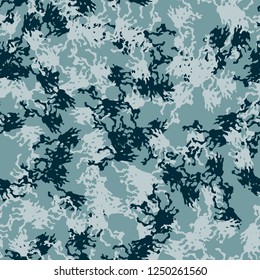 Winter camouflage of various shades of blue color. It is a colorful seamless pattern that can be used as a camo print for clothing and background and backdrop or computer wallpaper