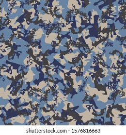 Winter camouflage of various shades of blue and beige colors. It is a colorful seamless pattern that can be used as a camo print for clothing and background and backdrop or computer wallpaper