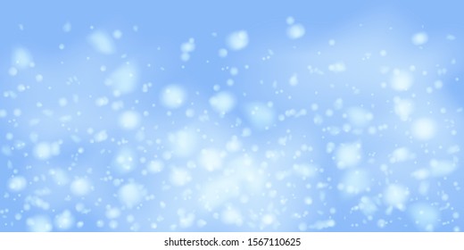 Winter Christmas background with sky, heavy snowfall. Falling Christmas Shining white transparent beautiful snow. Happy new year decoration. Snowflakes, snowfall.