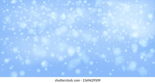 Winter Christmas background with sky, heavy snowfall. Falling Christmas Shining white transparent beautiful snow. Happy new year decoration. Snowflakes, snowfall.