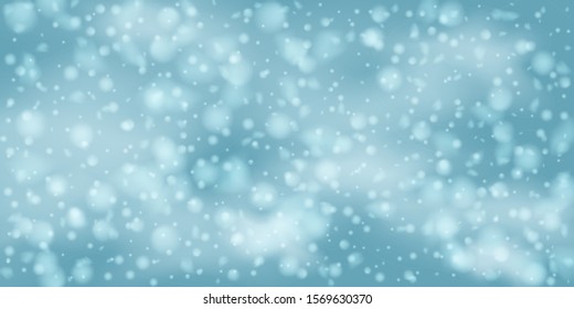 Winter Christmas background with sky, heavy snowfall. Falling Christmas Shining white transparent beautiful snow. Happy new year decoration. Snowflakes, snowfall.