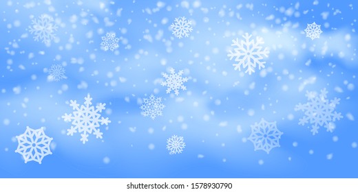 Winter Christmas background with sky, heavy snowfall. Falling Christmas Shining white transparent beautiful snow. Happy new year decoration. Snowflakes, snowfall.