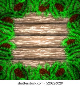 Winter christmas background.Christmas tree and pine on the wooden background.