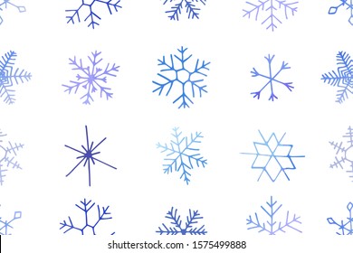 Winter christmas seamless pattern with artistic blue snowflakes. Vector set. Can be used for printed materials, prints, posters, cards, wallpaper. Holiday background. Hand drawn decorative elements. 