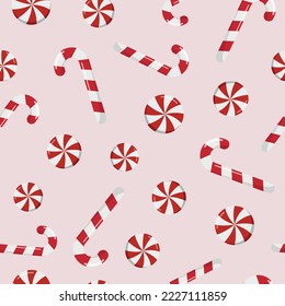 Winter Christmas seamless pattern with candy canes and round swirl candy on beige background. Background for printing, winter holidays, greeting cards, fabric, textiles, and wrapping paper.