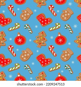 Winter Christmas seamless pattern with gingerbread and cookies on a blue background.  Symbols of a Happy New Year and Christmas. Home decorations, gift wrapping paper, covers, fabrics.