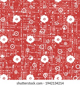 Winter christmas seamless Pattern with small white flowers on a red textured check background. 
