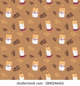 Winter Christmas vector seamless pattern with festive candles and fir branches on brown background.