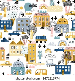 Winter city cartoon vector seamless pattern. Kids textile, wrapping paper, wallpaper design. Background with houses, trees and cars. Winter landscape